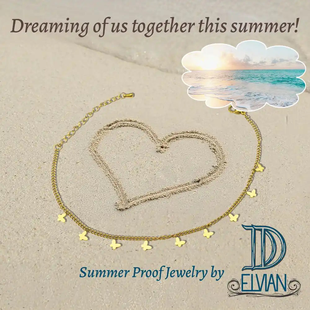 Gold butterfly charm necklace.