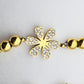 Gold Flower Beaded Bracelet - 18K Gold PVD on Stainless Steel with Flower Motif and brilliant CZ Accents (4 mm Beads