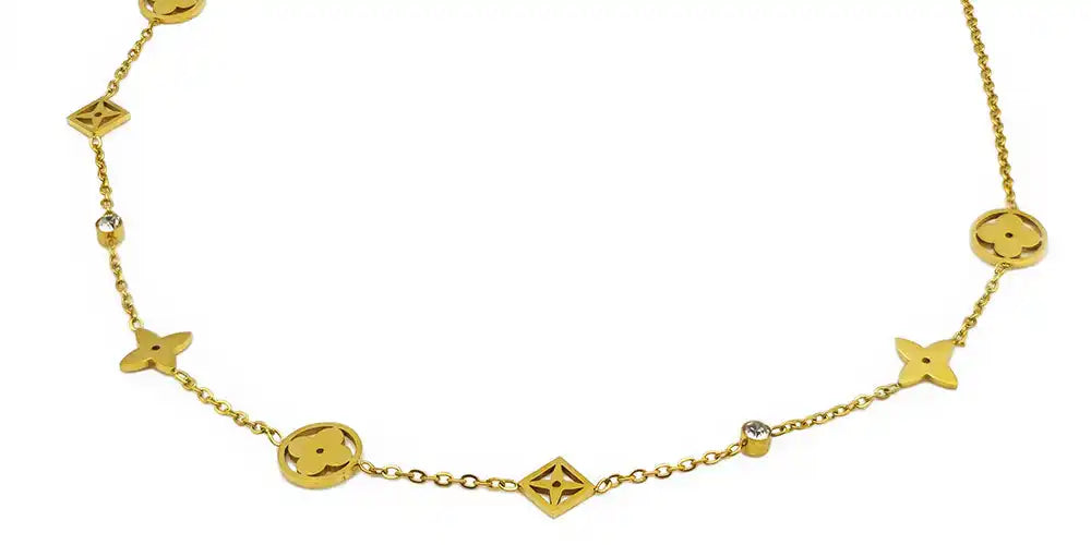 Gold-toned necklace with floral and diamond accents.